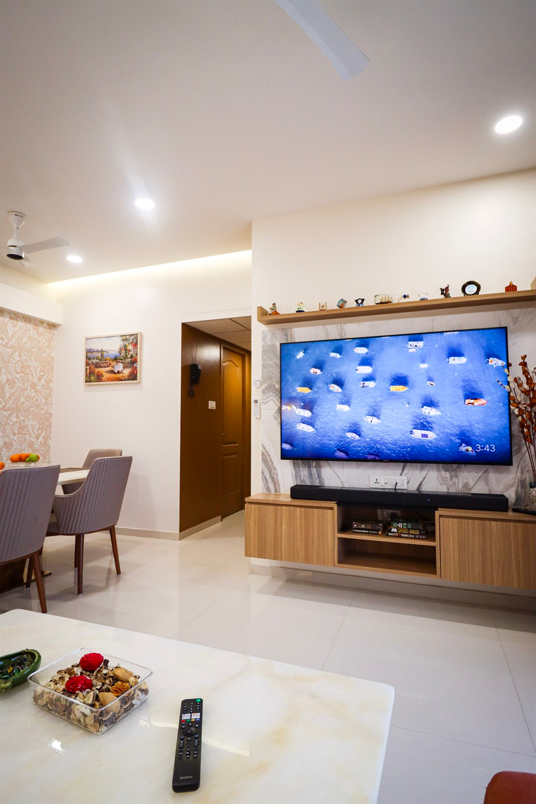 a tv on a shelf in a room