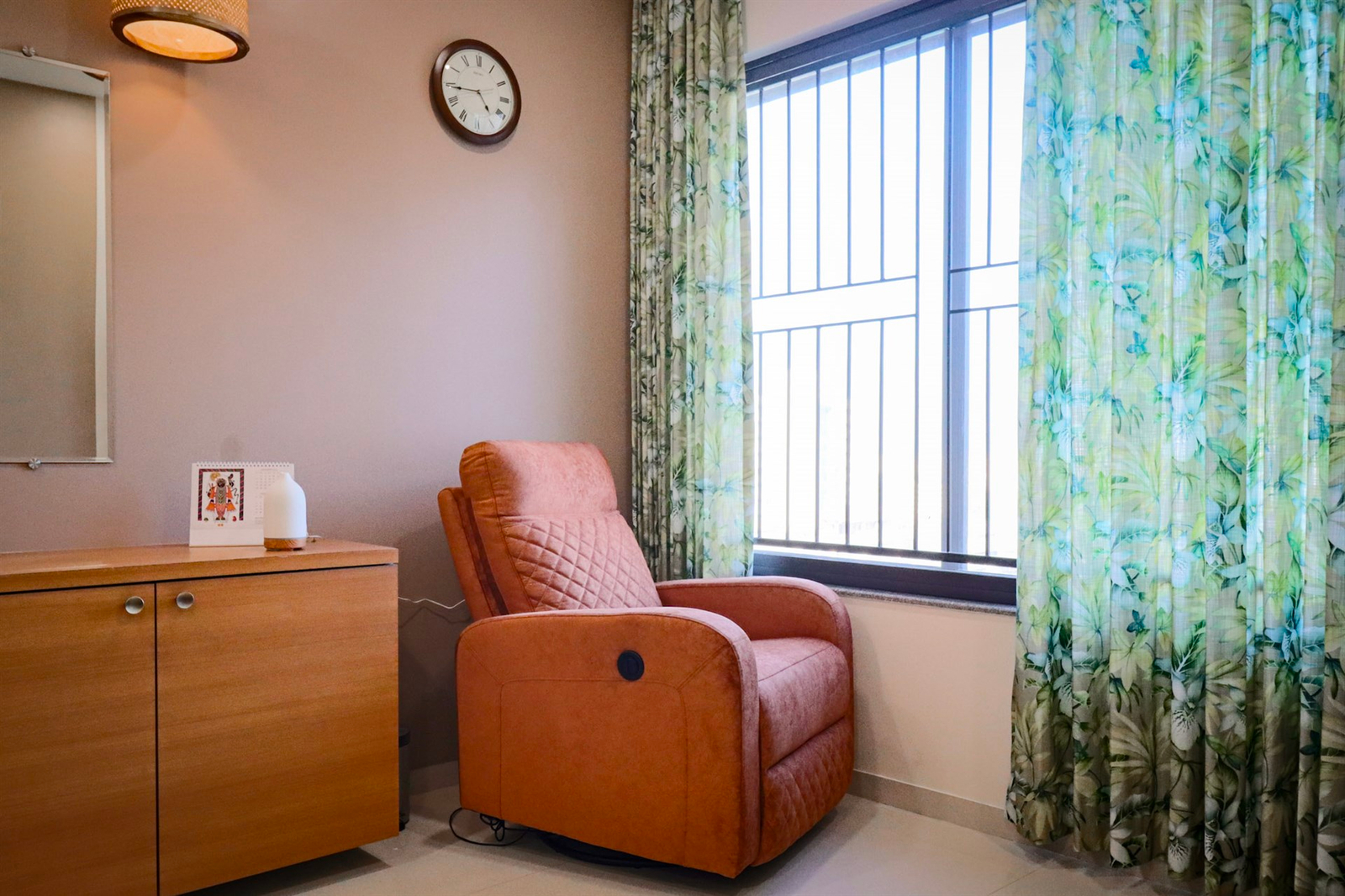 a chair next to a window