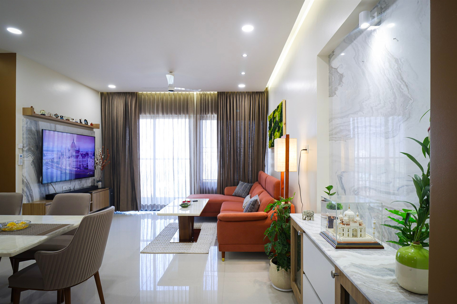 a living room with a tv and a couch