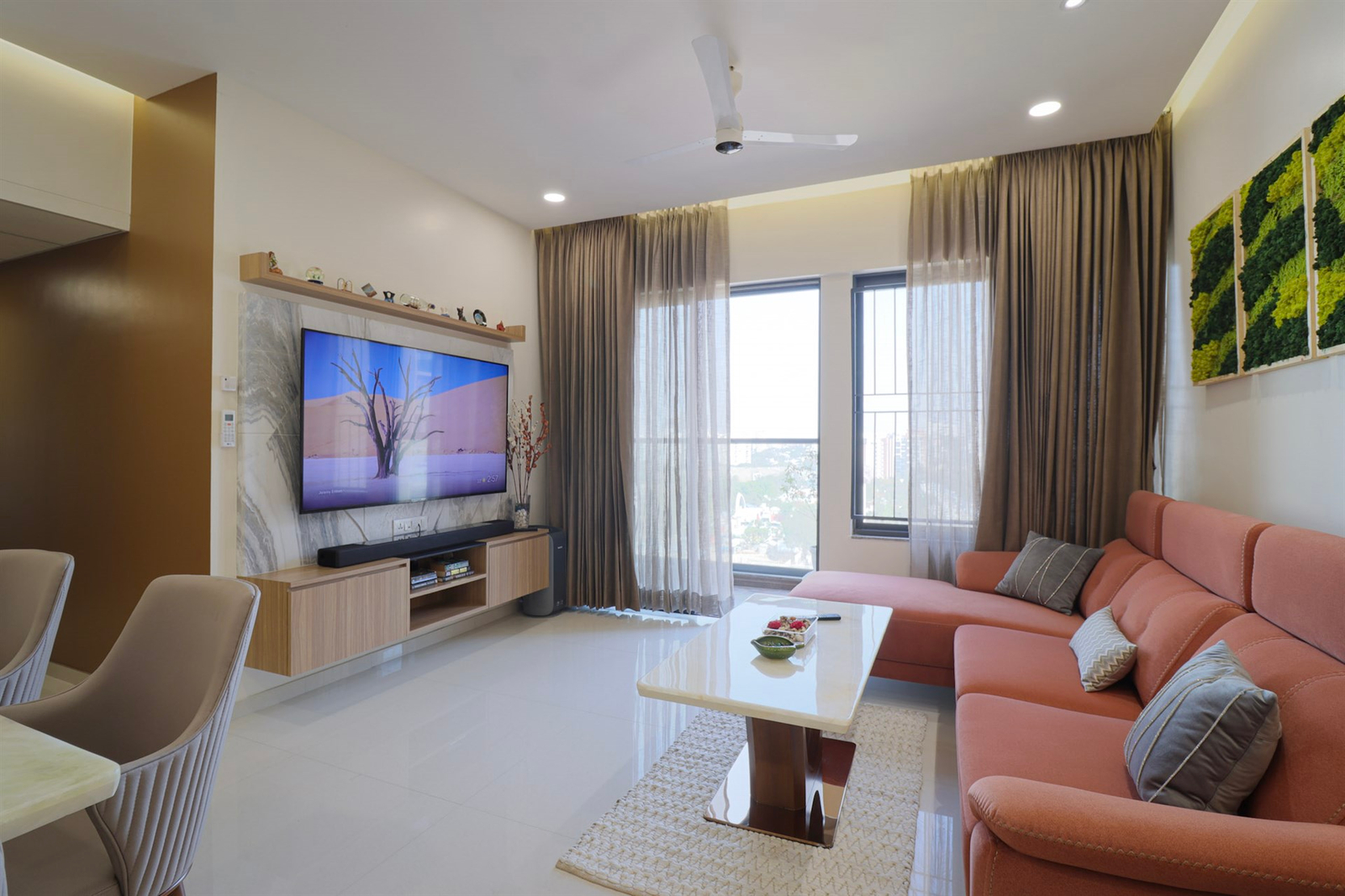 a living room with a tv and couch