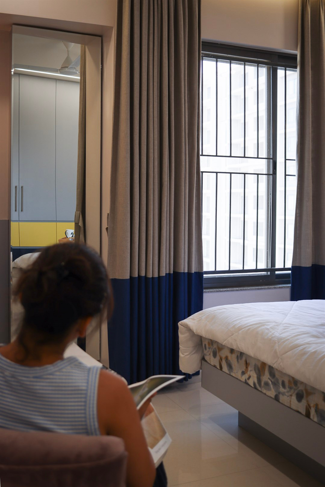 a woman sitting in a room