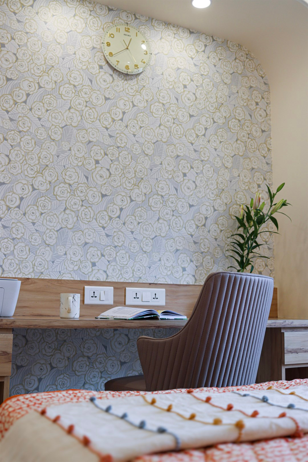 a chair and desk in a room