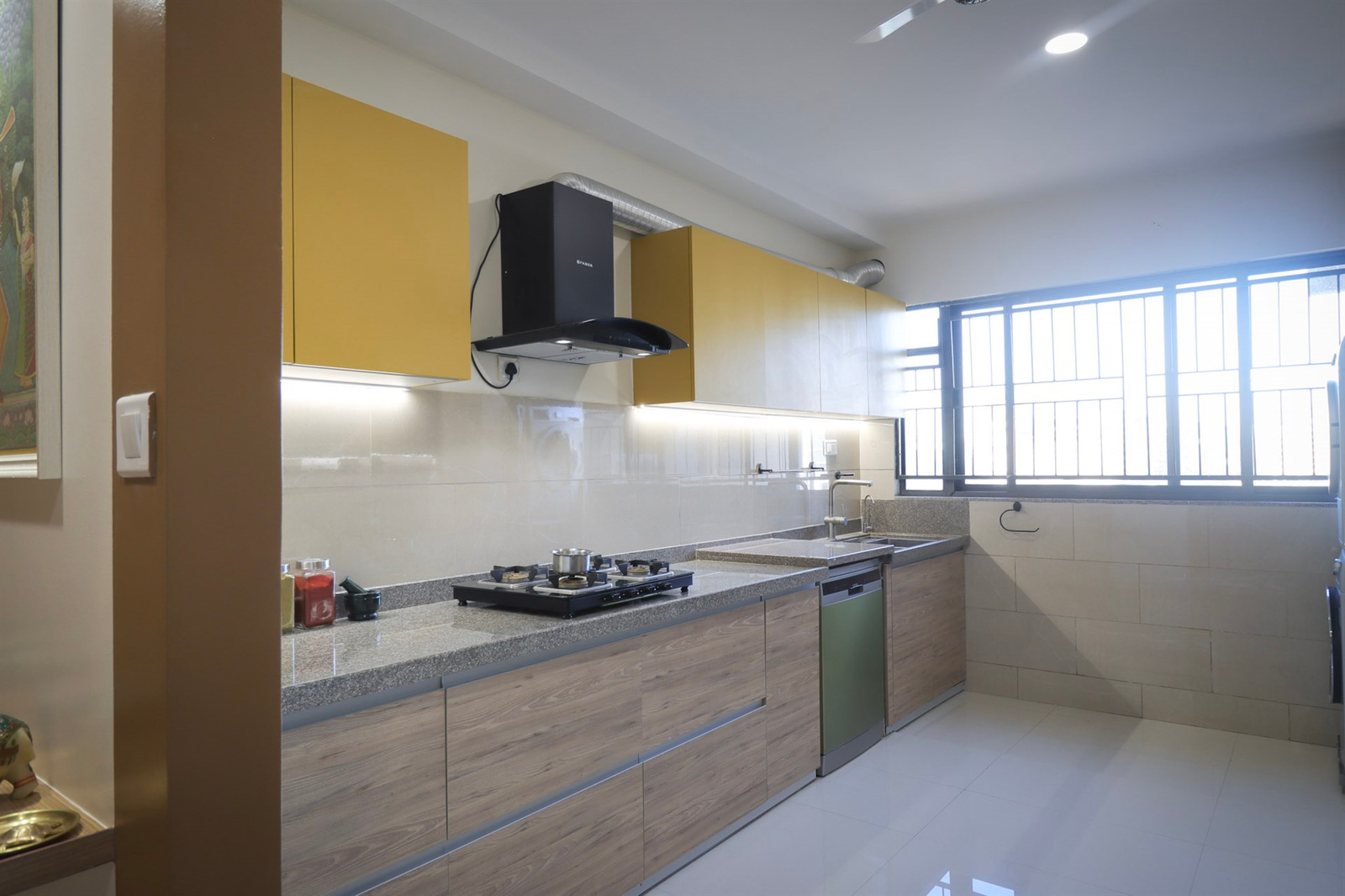a kitchen with a stove and oven