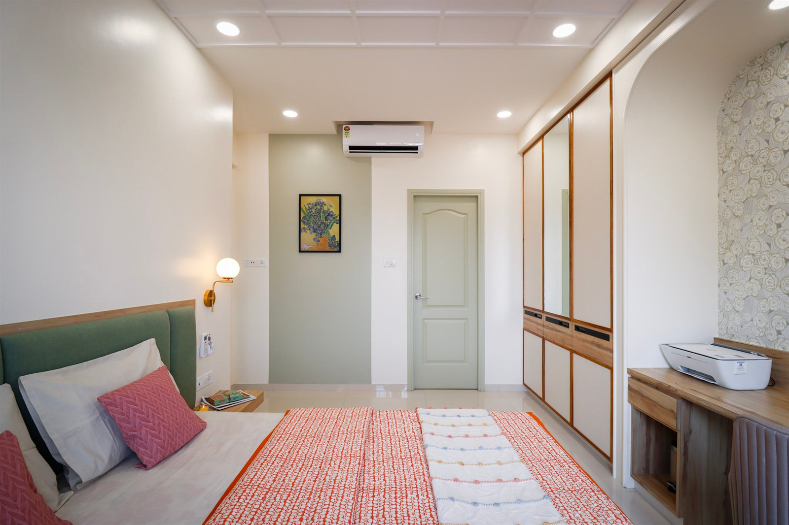 a bedroom with a bed and a door